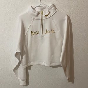 Nike cropped quarter zip in a size small.